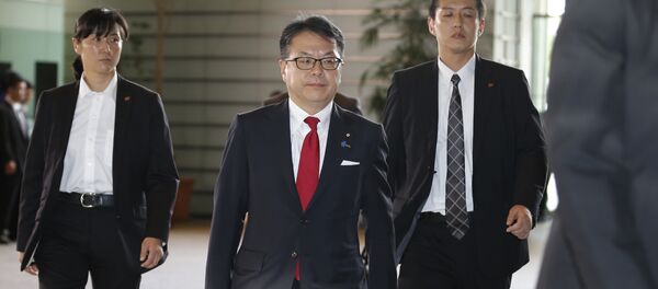 Japan's new Economy, Trade and Industry Minister Hiroshige Seko, center, arrives at the prime minister's official residence in Tokyo Japan's new Economy, Trade and Industry Minister Hiroshige Seko, center, arrives at the prime minister's official residence in Tokyo - Sputnik International