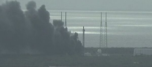 Smoke rising on the launch site of SpaceX Falcon 9 rocket in Cape Canaveral, Florida Smoke rising on the launch site of SpaceX Falcon 9 rocket in Cape Canaveral, Florida - Sputnik International
