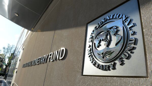 Logo of the International Monetary Fund on its office - Sputnik International