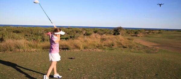 Hole in One! Young Golfer Knocks Down Drone Hole in One! Young Golfer Knocks Down Drone - Sputnik International