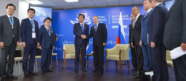 Japanese Prime Minister's Shinzo Abe and Russian President Vladimir Putin Japanese Prime Minister's Shinzo Abe and Russian President Vladimir Putin - Sputnik International