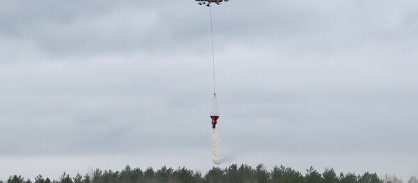 A KA-32A11BC helicopter firefighter during tactical specialized exervices in wildland firefighting in the Moscow Region. (File) A KA-32A11BC helicopter firefighter during tactical specialized exervices in wildland firefighting in the Moscow Region. (File) - Sputnik International