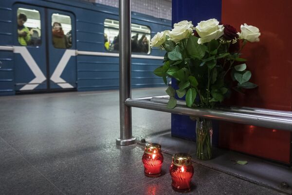 Flowers and candles in memory of people killed during the March 29, 2010 terrorist attacks at Moscow's Park Kultury metro station, part of the Sokolnicheskaya Line. Flowers and candles in memory of people killed during the March 29, 2010 terrorist attacks at Moscow's Park Kultury metro station, part of the Sokolnicheskaya Line. - Sputnik International