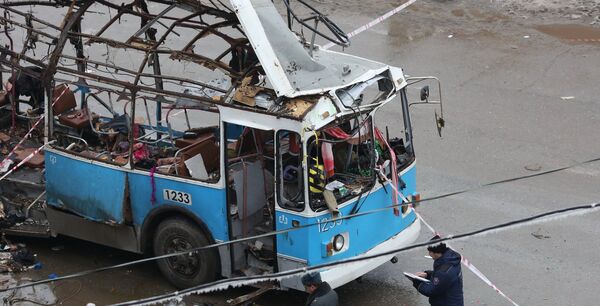 Agents of law enforcement and operative services work at the site of an explosion on a trolleybus near Kachinsky Market in Volgograd. (File) Agents of law enforcement and operative services work at the site of an explosion on a trolleybus near Kachinsky Market in Volgograd. (File) - Sputnik International