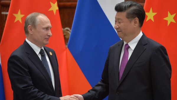 September 4, 2016. Russian President Vladimir Putin, left, and Chinese President Xi Jinping during a meeting in Hangzhou. - Sputnik International