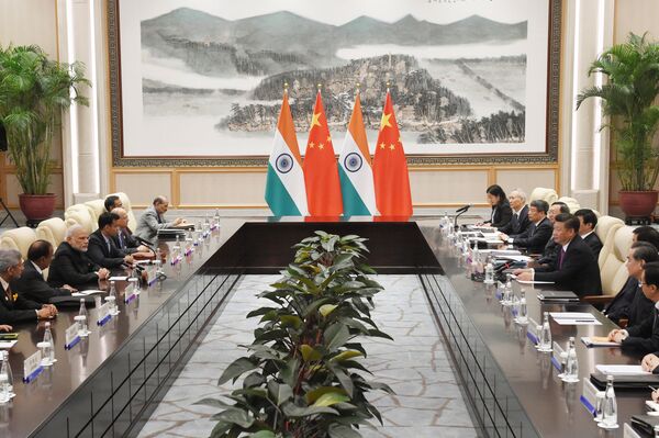 Indian Prime Minister Narendra Modi (3rd L) meets with Chinese President Xi Jinping (center R) at the West Lake State Guest House ahead of G20 Summit in Hangzhou, Zhejiang province, China, September 4, 2016. Indian Prime Minister Narendra Modi (3rd L) meets with Chinese President Xi Jinping (center R) at the West Lake State Guest House ahead of G20 Summit in Hangzhou, Zhejiang province, China, September 4, 2016. - Sputnik International