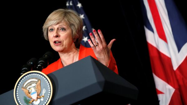 Britain's Prime Minister Theresa May answers a reporter's question  at G20 Summit, in Ming Yuan Hall at Westlake Statehouse in Hangzhou, China September 4, 2016. - Sputnik International