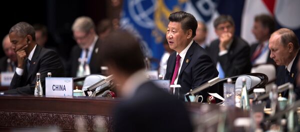 Chinese President Xi Jinping (C) makes a speech during the opening ceremony of the G20 Leaders Summit as US President Barack Obama (L) and Russia's President Vladimir Putin (R) listen in Hangzhou, Zhejiang province, China, September 4, 2016. Chinese President Xi Jinping (C) makes a speech during the opening ceremony of the G20 Leaders Summit as US President Barack Obama (L) and Russia's President Vladimir Putin (R) listen in Hangzhou, Zhejiang province, China, September 4, 2016. - Sputnik International
