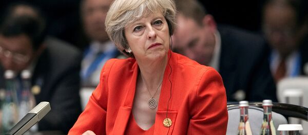 Britain's Prime Minister Theresa May listens to the speech of China's President Xi Jinping during the opening ceremony of the G20 Summit in Hangzhou, China, September 4, 2016. Britain's Prime Minister Theresa May listens to the speech of China's President Xi Jinping during the opening ceremony of the G20 Summit in Hangzhou, China, September 4, 2016. - Sputnik International