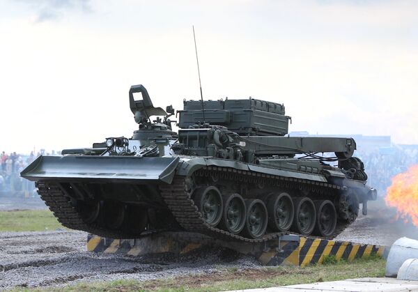 The BREM-1 armored recovery vehicle showing off its capabilities at a military show. The BREM-1 armored recovery vehicle showing off its capabilities at a military show. - Sputnik International