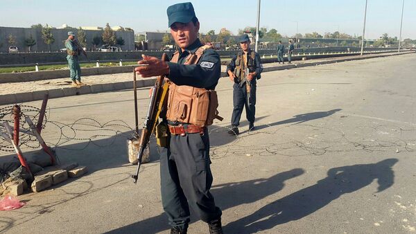 Afghan policemen stand guard at the site of a blast in Kabul, Afghanistan September 5, 2016 - Sputnik International