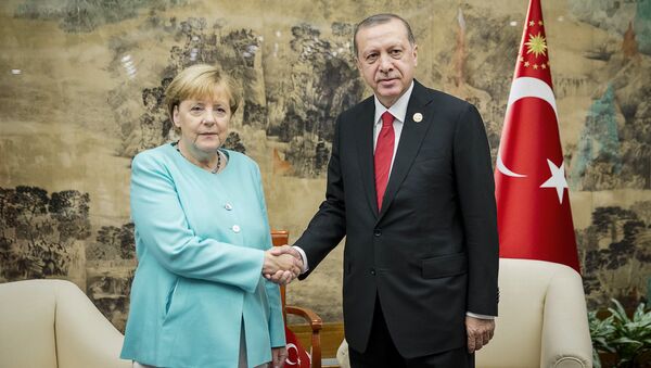 German Chancellor Angela Merkel meets Turkish President Tayyip Erdogan during the G20 Summit in Hangzhou, Zhejiang province, China, September 4, 2016 - Sputnik International