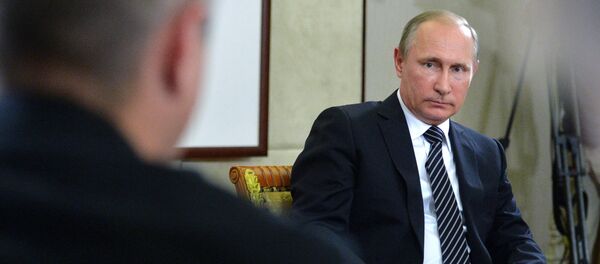 Russian President Vladimir Putin listens to a question during a press conference after the conclusion of the G-20 Summit in Hangzhou in eastern China's Zhejiang Province, Monday, Sept. 5, 2016 - Sputnik International