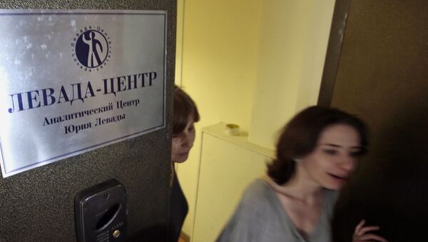 Levada Center employees leave their office with the sign  Levada-center. Jury Levada analytic center. in Moscow, Russia, Monday, May 20, 2013 - Sputnik International