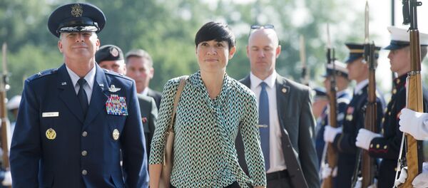 Norway's Defense Minister Ine Marie Eriksen Søreide walks past an honor guard as he arrives to attend a meeting of defense ministers of the Global Coalition to Counter ISIL at Joint Base Andrews in Maryland, July 20, 2016 - Sputnik International