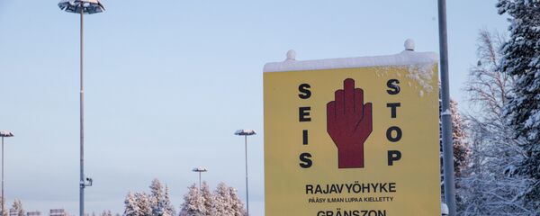 In this picture taken January 20, 2016, border zone signs are seen at the Finnish-Russian border in Salla, northern Finland - Sputnik International