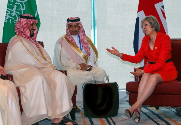 Britain's Prime Minister Theresa May (R) and Saudi Arabia's Deputy Crown Prince Mohammed bin Salman (L) meet ahead of G20 Summit in Hangzhou, Zhejiang province, China, September 4, 2016. - Sputnik International