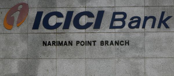 Pedestrians walking outside the ICICI bank in Mumbai, India. (File) Pedestrians walking outside the ICICI bank in Mumbai, India. (File) - Sputnik International