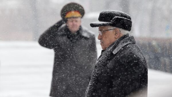 Palestinian President Mahmoud Abbas attends a wreath laying ceremony at the Tomb of Unknown Soldier in Moscow, Russia, Thursday, March 14, 2013. - Sputnik International