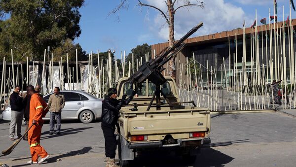 Forces of the Military Council of Tripoli stand guard next to the General National Congress (GNC) in Tripoli after dozens of protesters stormed the parliament and wounded two of its members. (File) - Sputnik International