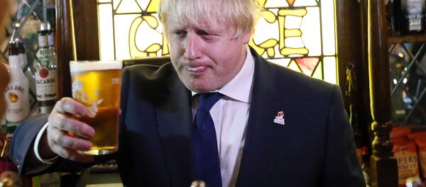 Former London Mayor, and Vote Leave campaigner, Boris Johnson is pictured with a pint of beer ahead of meeting with members of the public and supporters in Piercebridge, near Darlington, north-east England. (File) Former London Mayor, and Vote Leave campaigner, Boris Johnson is pictured with a pint of beer ahead of meeting with members of the public and supporters in Piercebridge, near Darlington, north-east England. (File) - Sputnik International