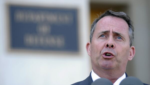 FILE- In this Tuesday, April 26, 2011 file photo, the then British Defense Minister Liam Fox speaks during joint statement with Defense Secretary Robert Gates, at the Pentagon. - Sputnik International