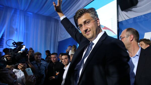 Andrej Plenkovic, president of the Croatian Democratic Union (HDZ), reacts during a speech after exit polls in Zagreb, Croatia, September 11, 2016 - Sputnik International