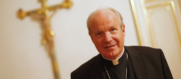Austrian Cardinal Christoph Schoenborn, Archbishop of Vienna, poses for photo after a press meeting in Vienna on September 19, 2012. Austrian Cardinal Christoph Schoenborn, Archbishop of Vienna, poses for photo after a press meeting in Vienna on September 19, 2012. - Sputnik International