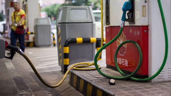 This photo taken on August 27, 2014 shows a petrol pump at a PetroChina petrol station in Shanghai - Sputnik International