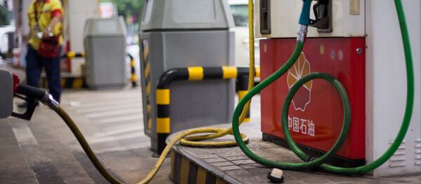 This photo taken on August 27, 2014 shows a petrol pump at a PetroChina petrol station in Shanghai - Sputnik International
