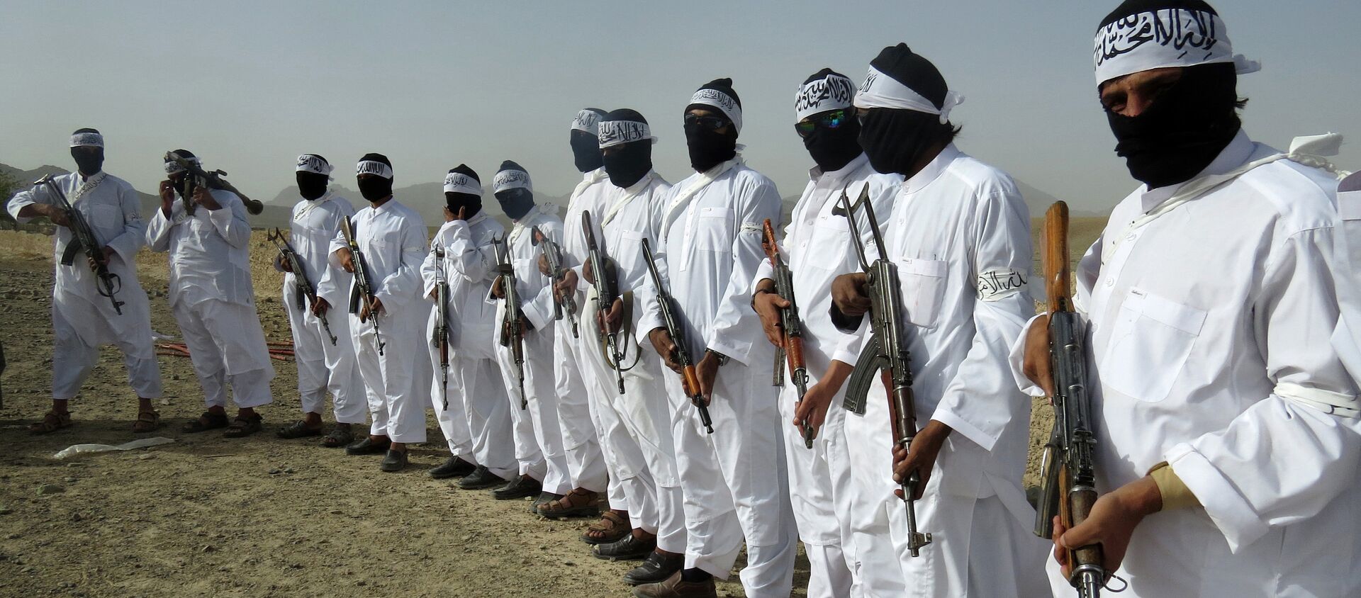 File, In this Aug. 15, 2016 photo, Taliban suicide bombers stand guard during a gathering of a breakaway Taliban faction, in the border area of Zabul province, Afghanistan - Sputnik International, 1920, 09.07.2021