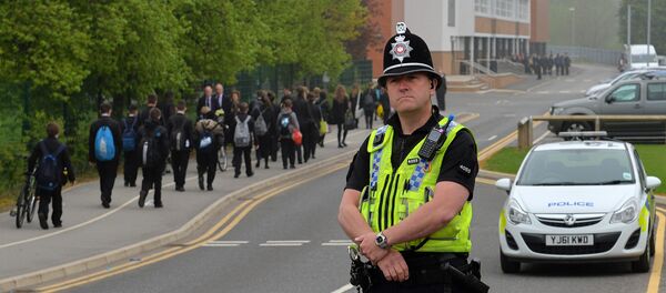 A police officer stands at Corpus Christi Catholic College in Leeds, northern England on April 29, 2014 A police officer stands at Corpus Christi Catholic College in Leeds, northern England on April 29, 2014 - Sputnik International
