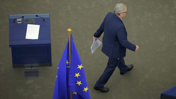 European Commission President Jean-Claude Juncker leaves the desk after his address to the European Parliament during a debate on The State of the European Union in Strasbourg, France, September 14, 2016 - Sputnik International