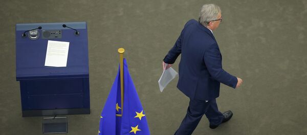 European Commission President Jean-Claude Juncker leaves the desk after his address to the European Parliament during a debate on The State of the European Union in Strasbourg, France, September 14, 2016 - Sputnik International