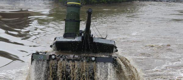 A main battle tank 'Leopard 2 A6' is going out a pond during an exercise of the German army on the training area in Munster, Germany, Monday, June 15, 2009 A main battle tank 'Leopard 2 A6' is going out a pond during an exercise of the German army on the training area in Munster, Germany, Monday, June 15, 2009 - Sputnik International
