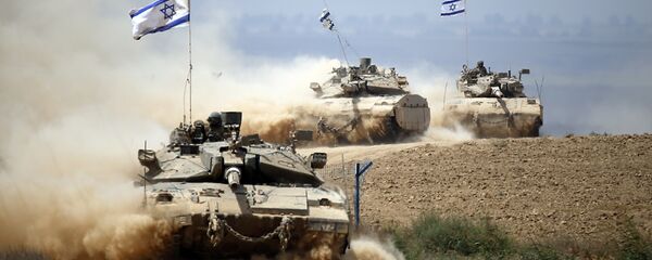 Israeli Merkava tanks roll near the border between Israel and the Gaza Strip as they return from the Hamas-controlled Palestinian coastal enclave on August 5, 2014 Israeli Merkava tanks roll near the border between Israel and the Gaza Strip as they return from the Hamas-controlled Palestinian coastal enclave on August 5, 2014 - Sputnik International