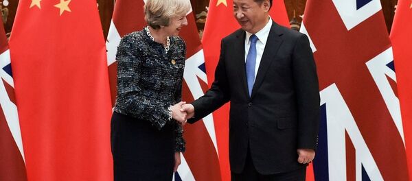 Chinese President Xi Jinping (R) shakes hand with British Prime Minister Theresa May before their meeting at the West Lake State House on the sidelines of the G20 Summit, in Hangzhou, Zhejiang province, China, September 5, 2016. Chinese President Xi Jinping (R) shakes hand with British Prime Minister Theresa May before their meeting at the West Lake State House on the sidelines of the G20 Summit, in Hangzhou, Zhejiang province, China, September 5, 2016. - Sputnik International