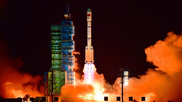 China's Tiangong 2 space lab is launched on a Long March-2F rocket from the Jiuquan Satellite Launch Center in the Gobi Desert, in China's Gansu province - Sputnik International