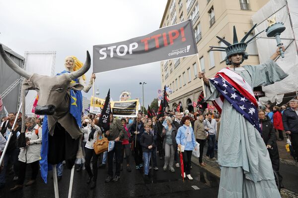 Consumer rights activists take part in a march to protest against the Transatlantic Trade and Investment Partnership (TTIP) and Comprehensive Economic and Trade Agreement (CETA) in Berlin, Germany Consumer rights activists take part in a march to protest against the Transatlantic Trade and Investment Partnership (TTIP) and Comprehensive Economic and Trade Agreement (CETA) in Berlin, Germany - Sputnik International