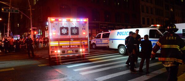 New York City police and firefighters stand near the site of an explosion in the Chelsea neighborhood of Manhattan, New York, U.S. September 17, 2016. New York City police and firefighters stand near the site of an explosion in the Chelsea neighborhood of Manhattan, New York, U.S. September 17, 2016. - Sputnik International