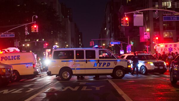 Police block off road near the site of an alleged bomb explosion on West 23rd Street on September 17, 2016, in New York. - Sputnik International