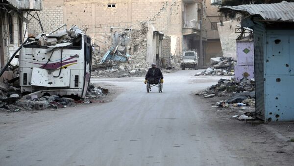 Devastated street in the Syrian eastern town of Deir Ezzor - Sputnik International