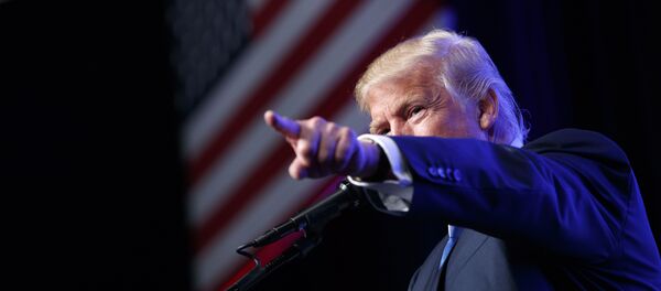 In this Sept. 16, 2016, photo, Republican presidential candidate Donald Trump speaks during a campaign rally at the James L. Knight Center in Miami. - Sputnik International