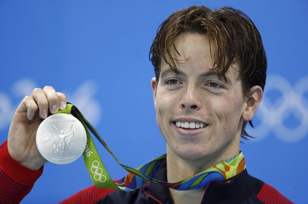 USA's silver medallist Connor Jaeger poses on the podium after the Men's swimming 1500m Freestyle Final at the Rio 2016 Olympic Games at the Olympic Aquatics Stadium in Rio de Janeiro - Sputnik International