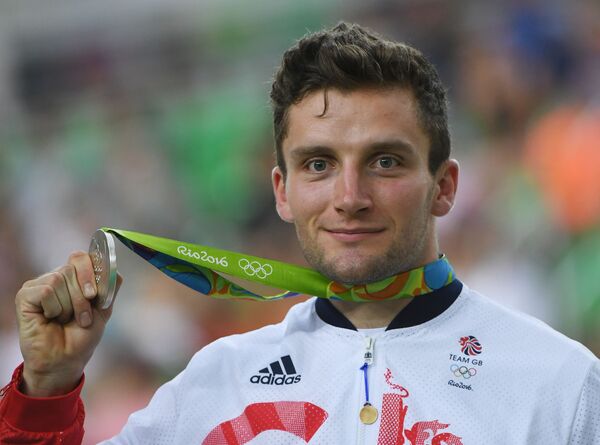 Silver medallist Britain's Callum Skinner poses on the podium after the Men's Sprint final track cycling event at the Velodrome during the Rio 2016 Olympic Games in Rio de Janeiro - Sputnik International