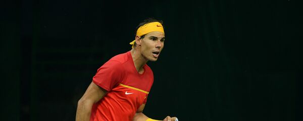 Spain's Rafael Nadal celebrates a point during his doubles tennis match with teammate Feliciano Lopez against India's Leander Peas and Saketh Myneni at the Davis Cup World Group tennis playoffs between Spain and India in New Delhi - Sputnik International