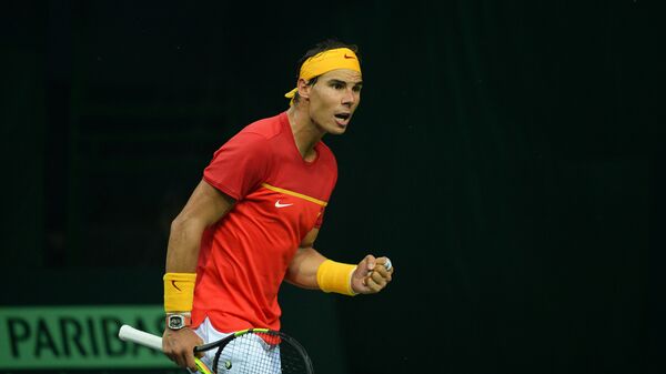 Spain's Rafael Nadal celebrates a point during his doubles tennis match with teammate Feliciano Lopez against India's Leander Peas and Saketh Myneni at the Davis Cup World Group tennis playoffs between Spain and India in New Delhi  - Sputnik International