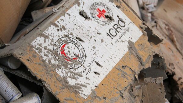 Damaged Red Cross and Red Crescent medical supplies lie inside a warehouse after an airstrike on the rebel held Urm al-Kubra town, western Aleppo city, Syria September 20, 2016. - Sputnik International