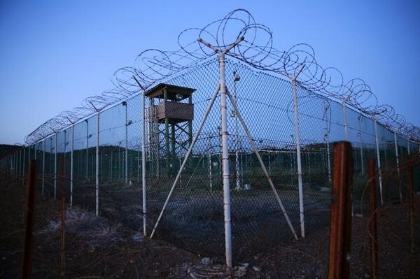 Chain link fence and concertina wire surrounds a deserted guard tower within Joint Task Force Guantanamo's Camp Delta at the US Naval Base in Guantanamo Bay, Cuba. Chain link fence and concertina wire surrounds a deserted guard tower within Joint Task Force Guantanamo's Camp Delta at the US Naval Base in Guantanamo Bay, Cuba. - Sputnik International