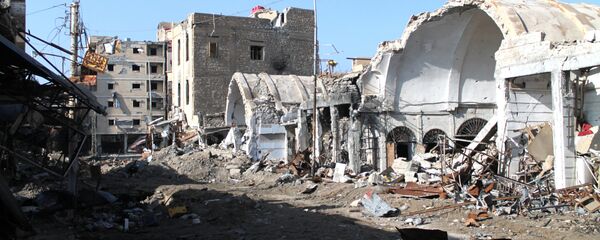 Destroyed buildings making up the souk or market in the old sector of the eastern city of Deir Ezzor, which lies in the eastern province of the same name - Sputnik International